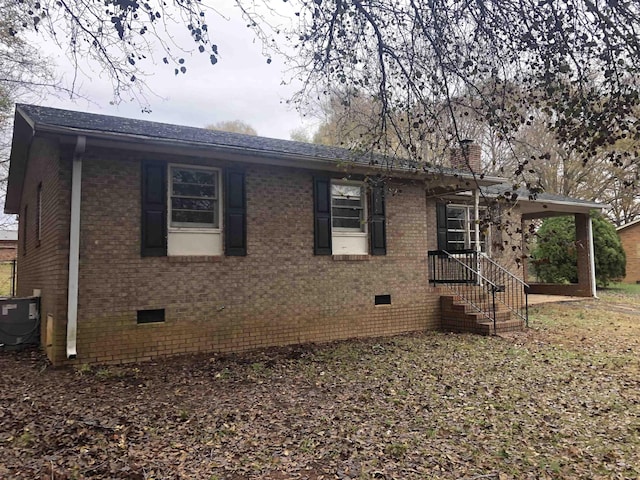 exterior space featuring central AC unit