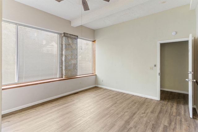 unfurnished room featuring ceiling fan, a textured ceiling, and hardwood / wood-style flooring