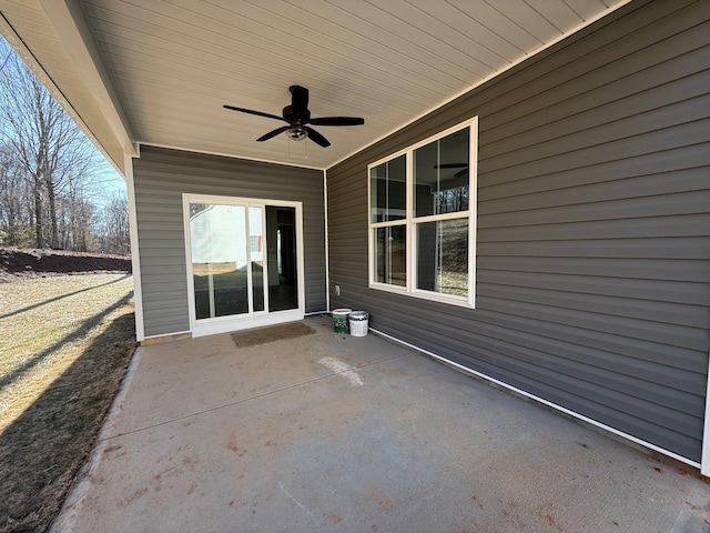 view of patio featuring ceiling fan