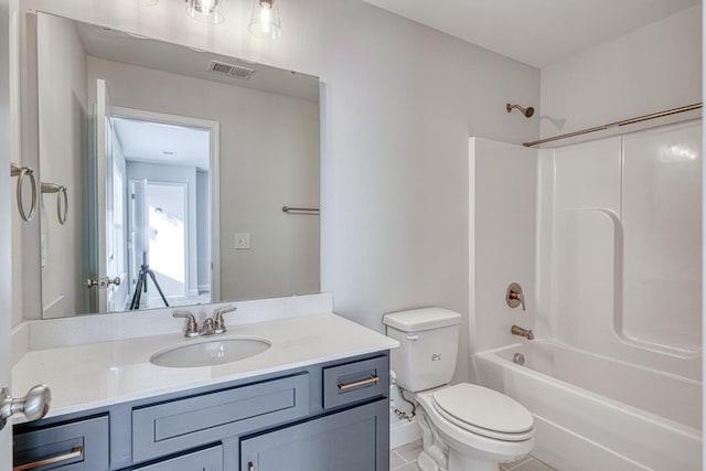 full bathroom featuring tile patterned floors, vanity, shower / bathtub combination, and toilet