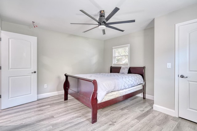 bedroom featuring ceiling fan and light hardwood / wood-style floors