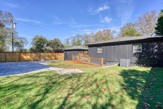 view of yard with a wooden deck