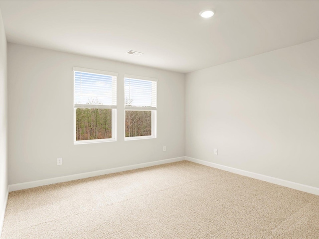 view of carpeted spare room