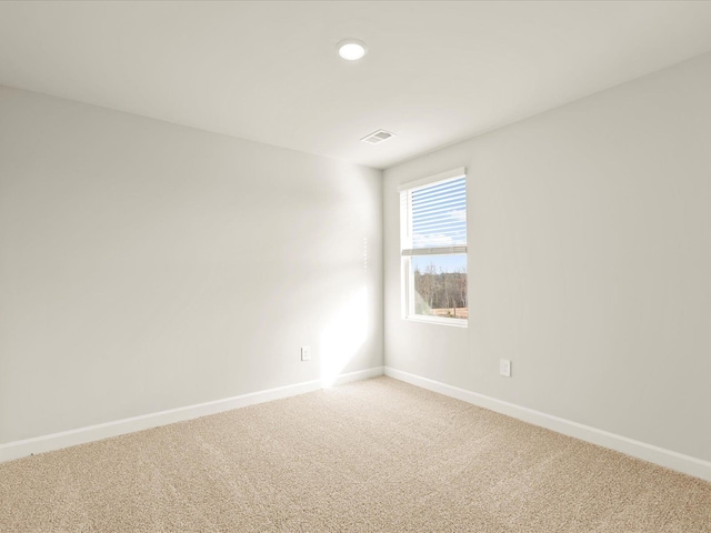 view of carpeted spare room