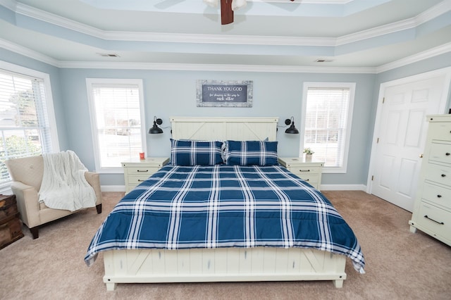 bedroom featuring multiple windows, ornamental molding, and ceiling fan