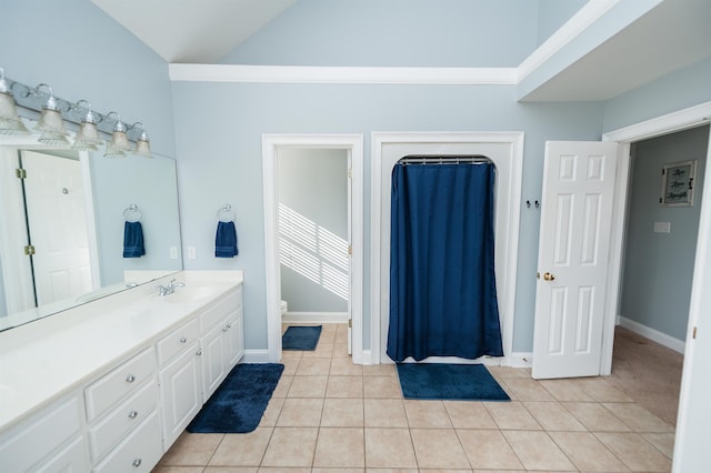 bathroom with vanity, a shower with curtain, crown molding, tile patterned flooring, and toilet