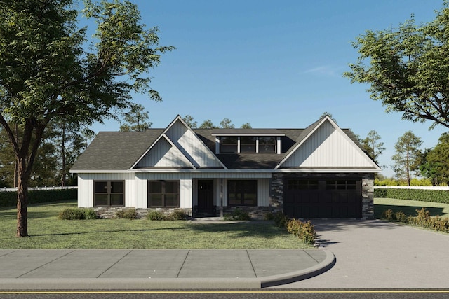 view of front facade featuring stone siding, an attached garage, concrete driveway, and a front lawn