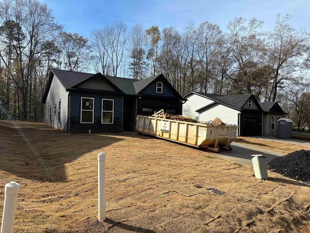 view of front of house with an attached garage and board and batten siding