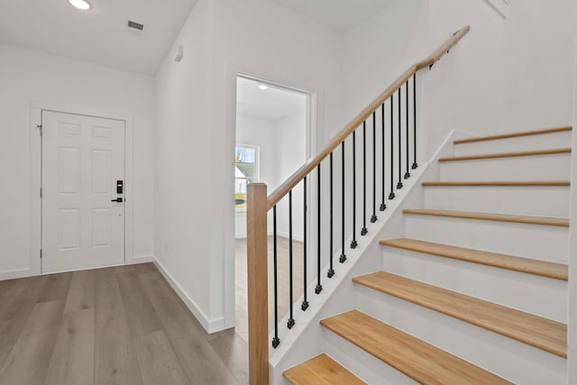 entrance foyer with light hardwood / wood-style floors