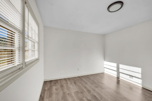 empty room featuring light hardwood / wood-style floors