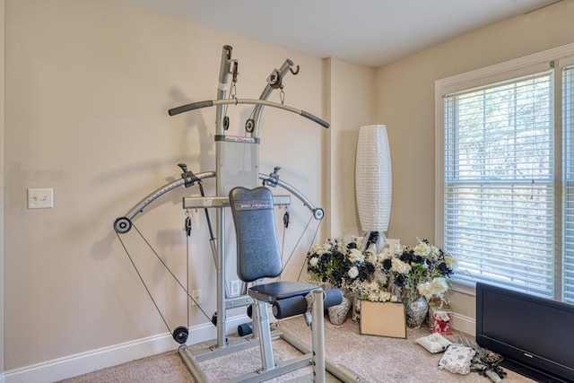 workout area with carpet floors