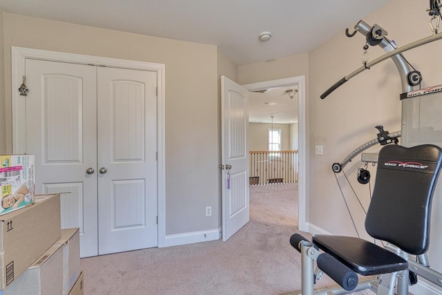 workout area with light colored carpet