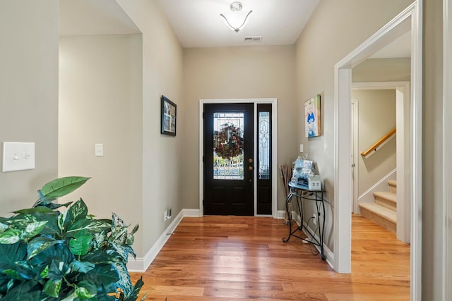 entryway featuring wood-type flooring