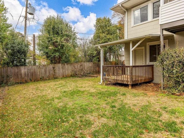 view of yard featuring a wooden deck