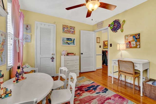 interior space featuring ceiling fan and light hardwood / wood-style flooring