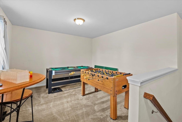 game room featuring light carpet