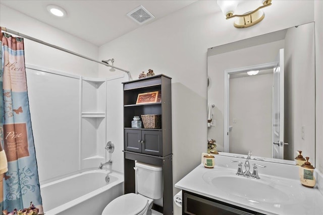 full bathroom with vanity, toilet, and shower / bath combo with shower curtain