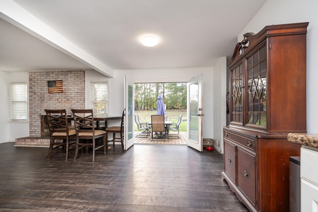 dining space featuring dark hardwood / wood-style floors