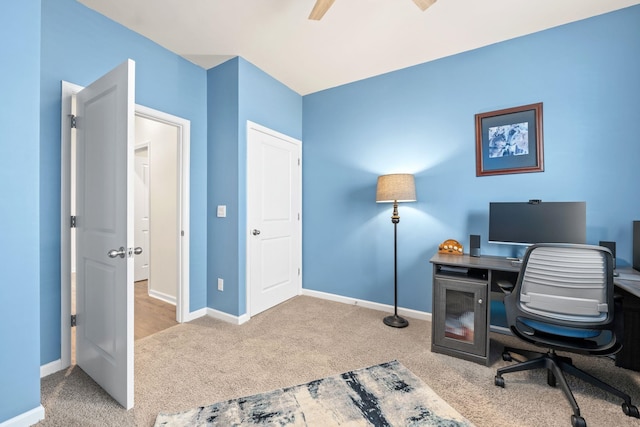 carpeted office with ceiling fan