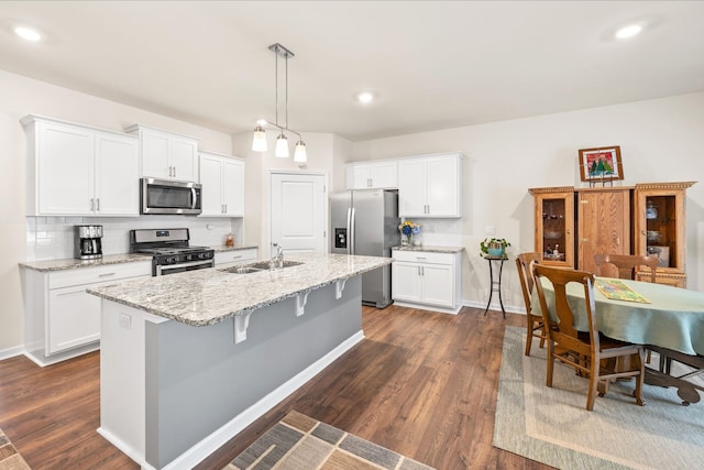 kitchen featuring white cabinets and stainless steel appliances