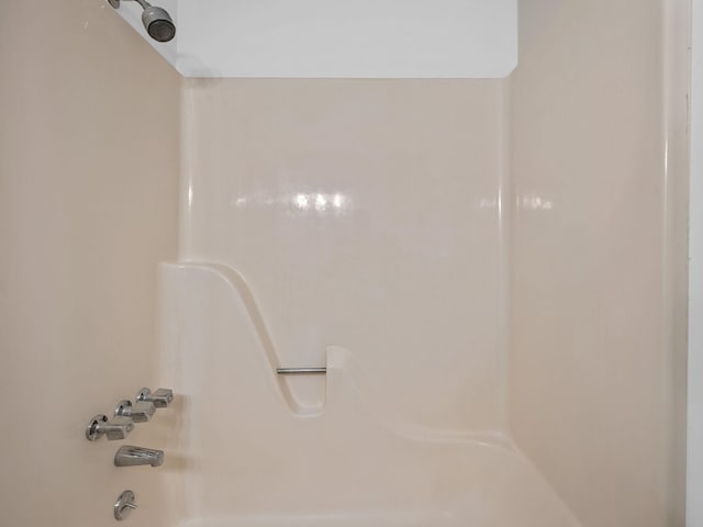 bathroom with shower / bathing tub combination