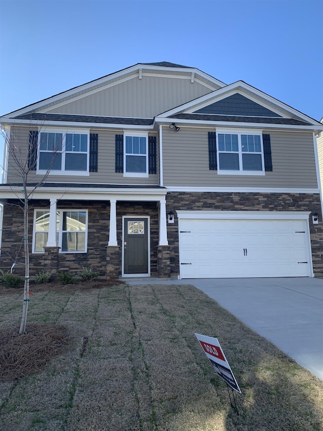 view of front of home with a garage