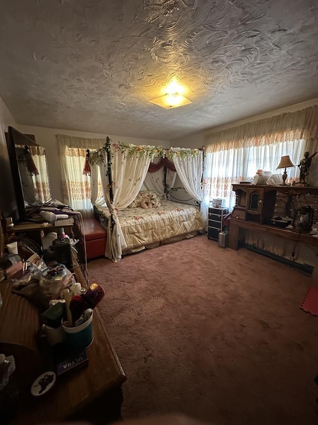 carpeted bedroom with a textured ceiling