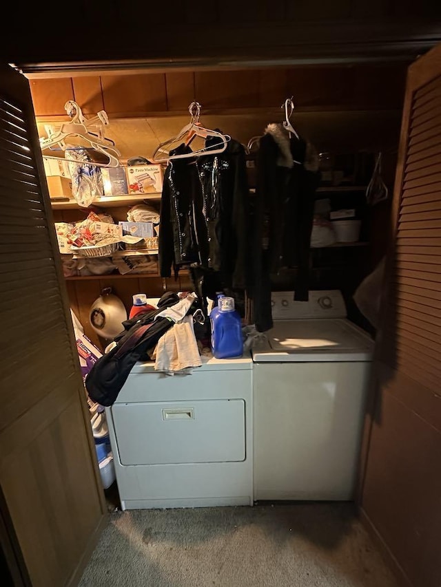 laundry room featuring independent washer and dryer and carpet floors