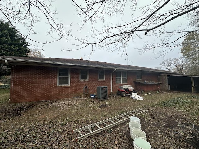 back of property featuring cooling unit