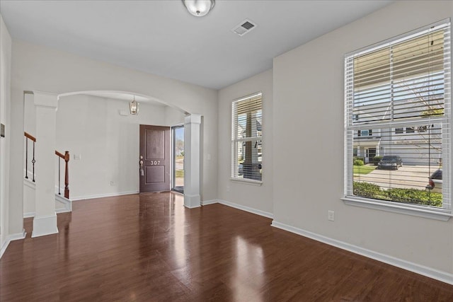 entryway featuring dark wood-type flooring