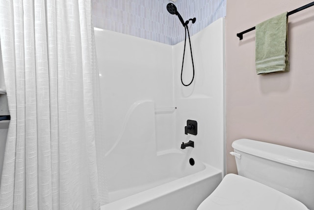 bathroom with shower / bath combination with curtain