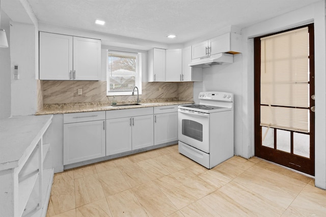 kitchen featuring white cabinetry, electric range, sink, tasteful backsplash, and a textured ceiling