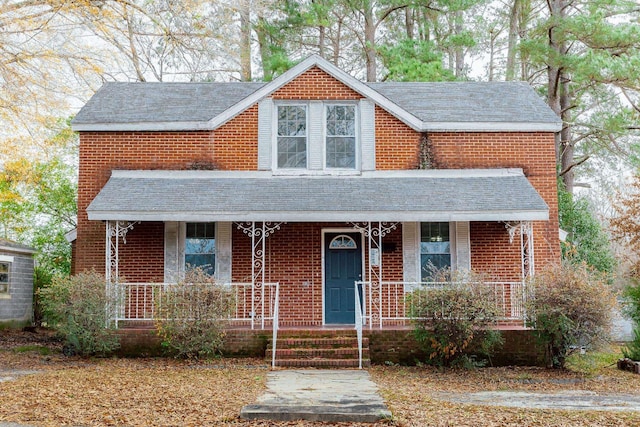 view of front of home featuring covered porch