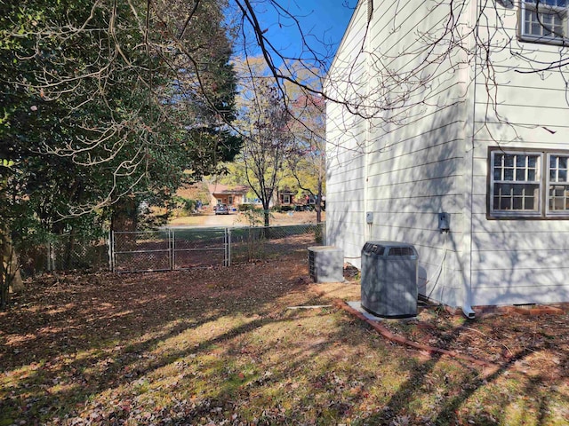 view of yard featuring central AC unit