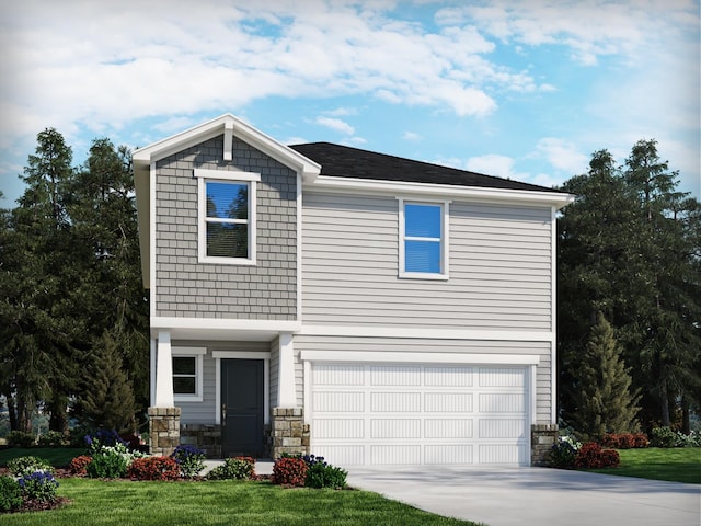 view of front of house with a garage and a front yard