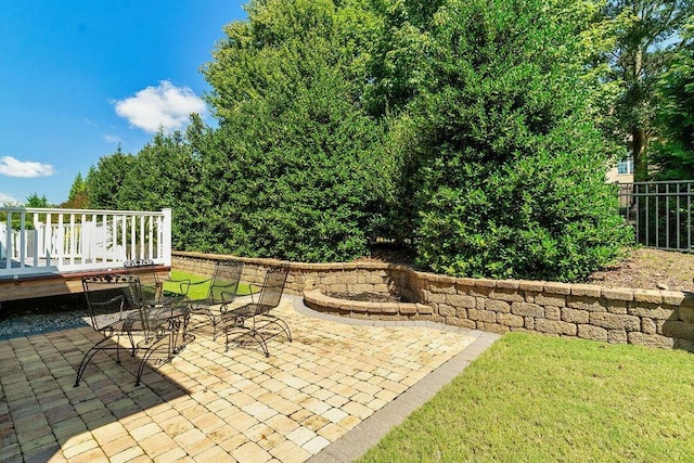 view of patio featuring a deck