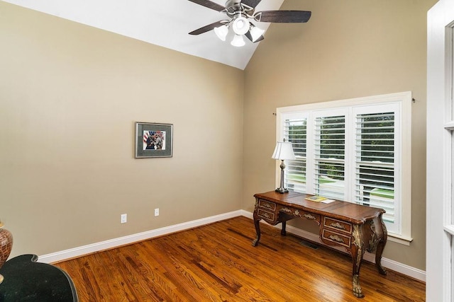 home office with lofted ceiling, ceiling fan, and wood-type flooring