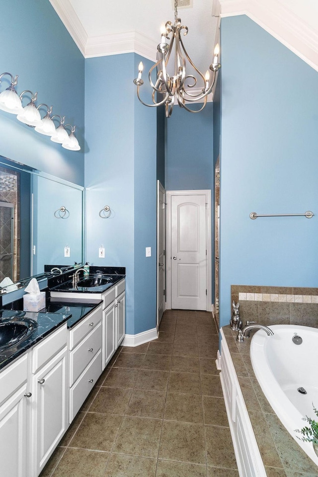 bathroom with vanity, an inviting chandelier, tile patterned floors, crown molding, and tiled tub