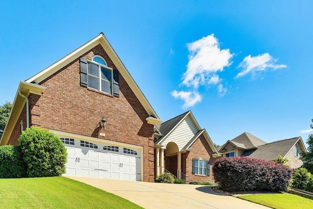 front of property featuring a garage and a front yard