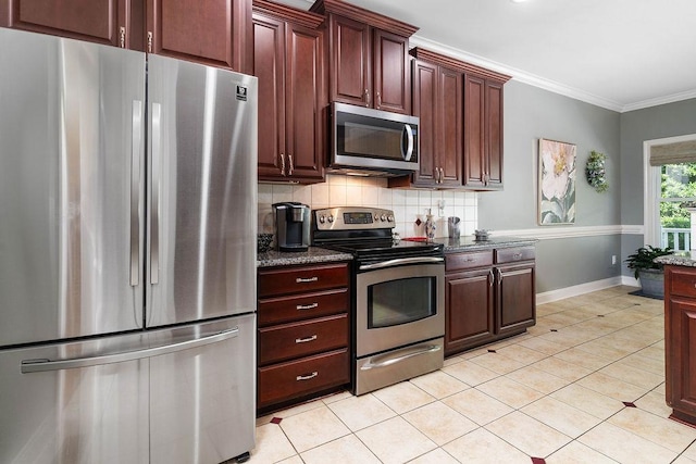 kitchen with stainless steel appliances, backsplash, dark stone countertops, crown molding, and light tile patterned floors