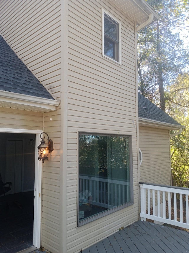 view of home's exterior featuring a deck