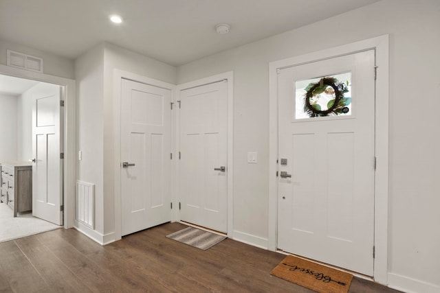 foyer featuring dark hardwood / wood-style floors