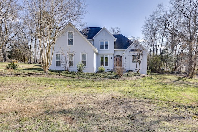 view of front of home featuring a front lawn