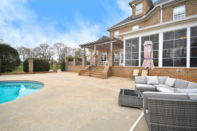 view of pool featuring an outdoor living space, a pergola, a patio, and a sunroom