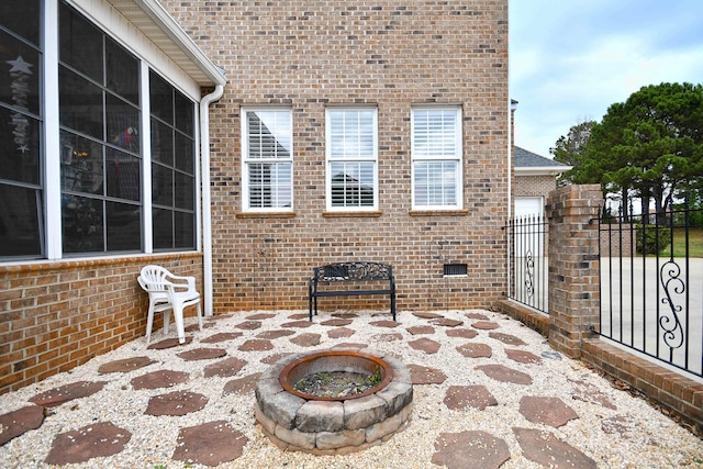 view of patio / terrace with a fire pit