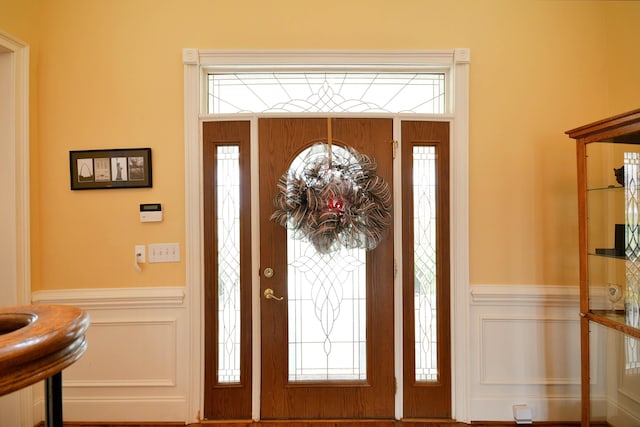 foyer with plenty of natural light