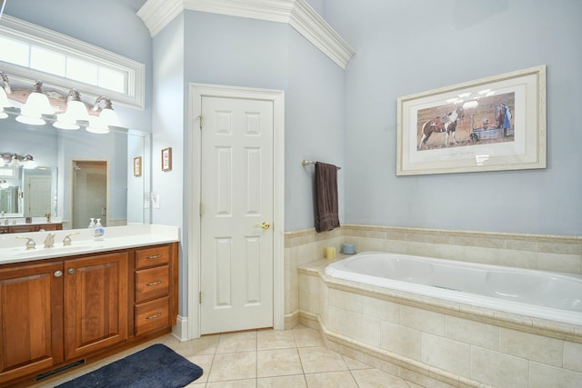 bathroom featuring tile patterned flooring, vanity, and a relaxing tiled tub