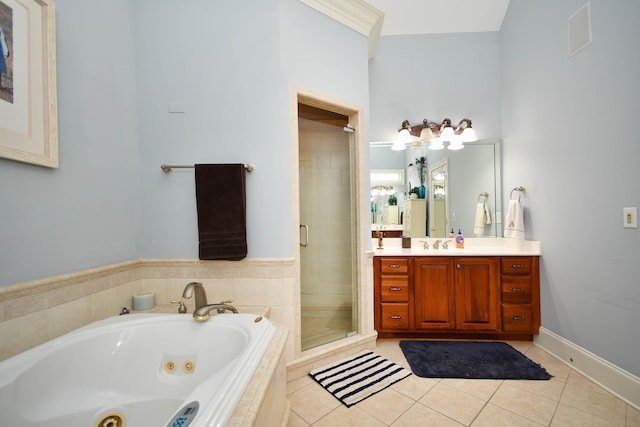 bathroom featuring tile patterned floors, vanity, and independent shower and bath