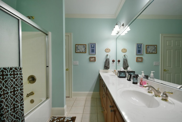 bathroom with vanity, tile patterned floors, crown molding, and enclosed tub / shower combo