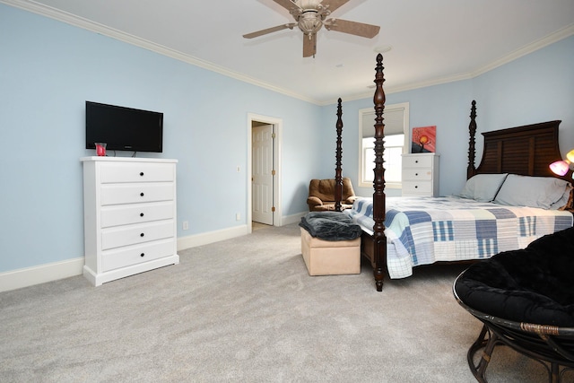 bedroom featuring light colored carpet, ceiling fan, and crown molding